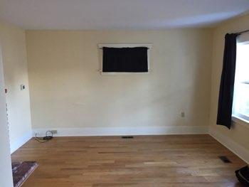 1. Living Room Living Room Walls and ceilings appear in good condition