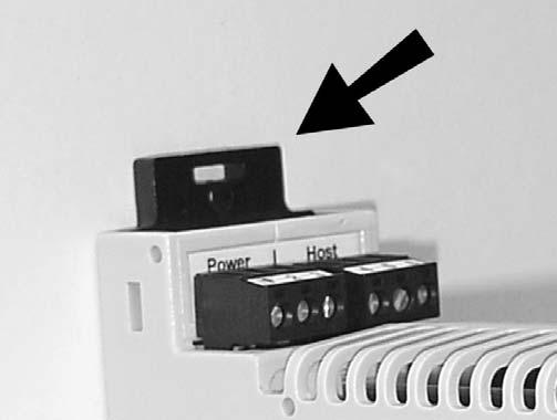 field wiring connections. Figure 3 - Removing from DIN rail 2.