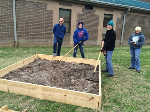 Despite a cold and rainy day, three 8 x 8 raised gardens were built with the help of Master Gardeners, Hope Barton and Susan Ason, and employees from Team Depot.