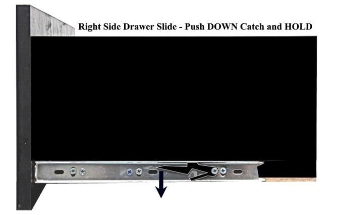 Push DOWN on the Right Side Drawer Catch and HOLD.