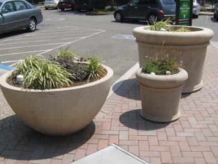 8. Encourage the use of planters to provide a flexible, inexpensive method to increase landscaping along the streetscape.
