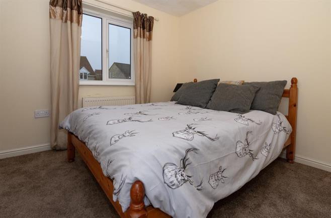 00m (9' 10") Window to the rear overlooking the views, radiator, neutral carpets,