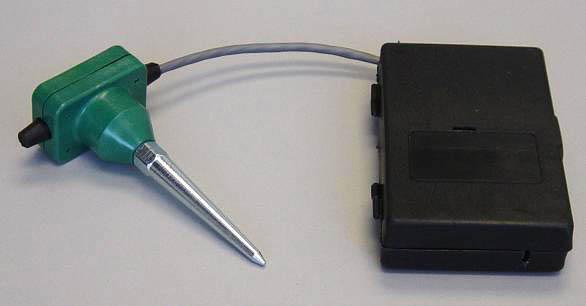 For field tests, breadboards with a battery were placed inside the plastic box. The Geophone GS-14LS was used in this standard case (Figure 3). Figure 3. Device used for field tests. 2.