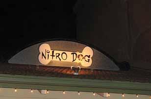 They may be lit only with external spot lights mounted on the roof below the sign.