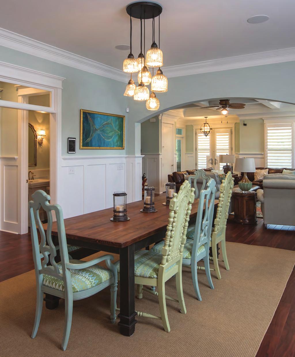 A large dining room table is perfect for entertaining guests, and is open