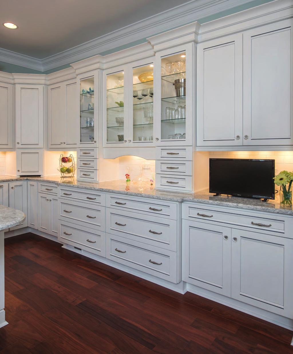 The kitchen offers lots of cabinet space for storage, and a