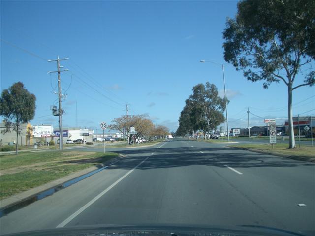 Figure 6: View west along Benalla Road main carriageway (subject site on left of photo) Figure 7: View west along Benalla Road service road (subject site on left of