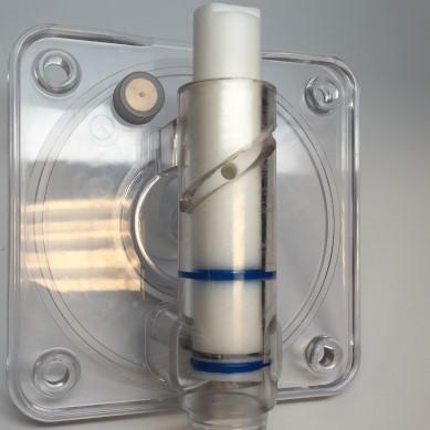 Insert draw valve 7/8 way into the dispensing door from the top, rotating as you install c.