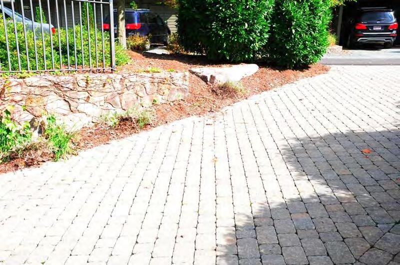 EXISTING STONE PAVERS AT DRIVEWAY