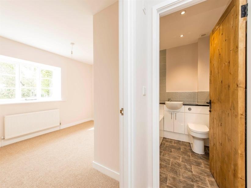 The flexible ground floor comprises of a welcoming reception hall, sitting room with open fireplace and numerous windows creating a light and airy ambience, a new additional doorway has been created