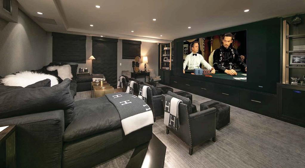 SCREENING ROOM The professional screening room offers best-in-class surround sound, a drop-down 12-foot screen and a