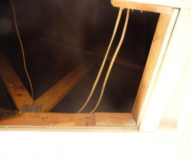Wires cross the attic access. Some evidence of water penetration, but time frame is difficult to determine. X E.
