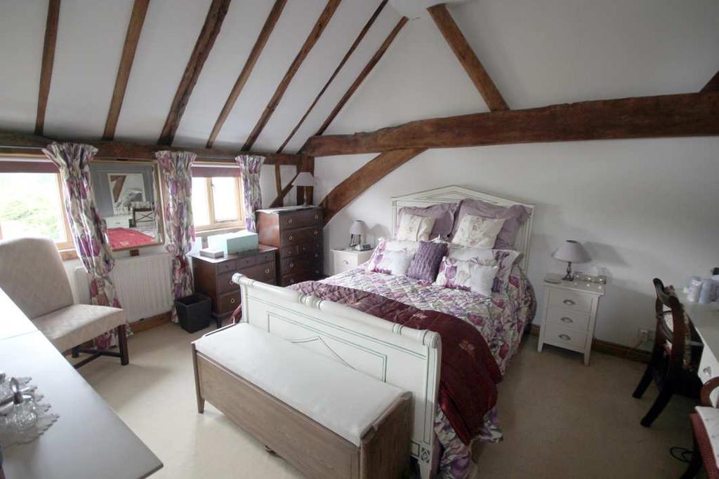 South Barn, Bassingbourn Road, Litlington, Herts SG8 0QN A charming Barn conversion tucked away in a village location, offering a wealth of character and spacious rooms, including vaulted ceilings