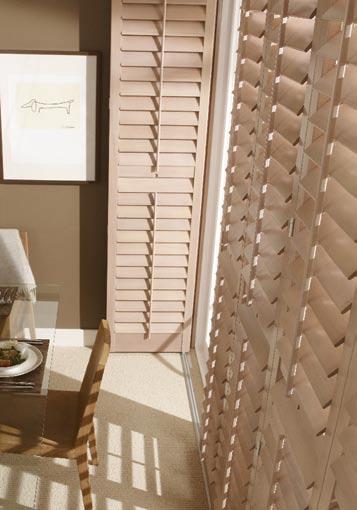 Quite often full height shutters will have a divider rail so you can operate the slats above and below it independently to control the light according to your