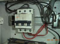 Locations: All Distribution Boards. Photograph: Electrical wiring/cables are not identified.
