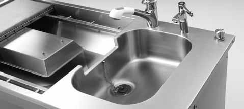 The table can be supplied in its basic form or in the enhanced version with integral sinks, with hot and cold mixer taps.