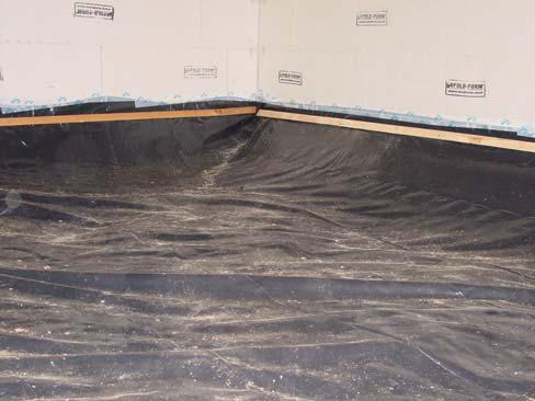 Secure ground moisture barrier to foundation before installing insulation.