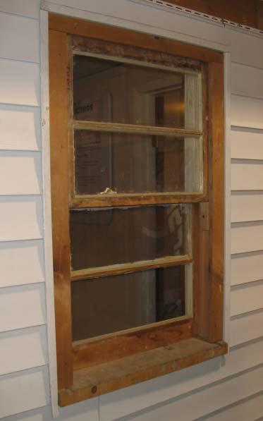 Safety glass is required in windows located within 12 inches of a door when the bottom edge is less than 60 inches above the floor or if panes are larger than 9 ft 2 when the bottom edge is less than