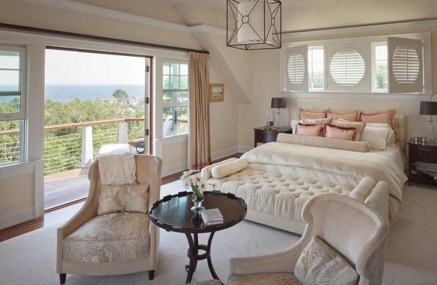 The inspiration for the interior design by Tracy Davis was feminine, fresh, and open (above). Davis designed the custom shutters in the master bedroom, starting with a napkin sketch.