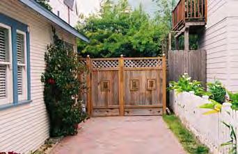 Solid rear yard fence Rustic stucco screen fence 24 inches high,