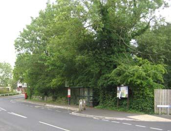 gates at the level crossing and the vista is closed by the houses on the north side of The Village (see Plate 16).