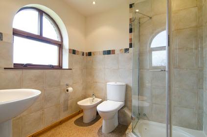 EN SUITE SHOWER ROOM: Comprising fully tiled shower cubicle