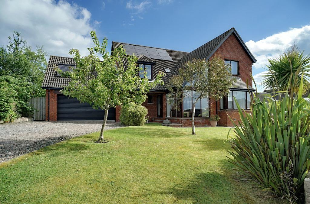 This most attractive detached family home occupies a superb site within this popular development situated just off the Portaferry Road.