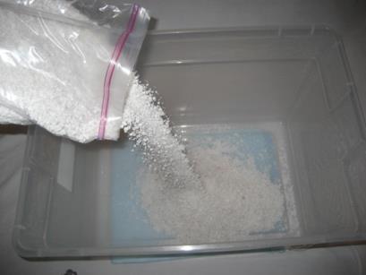 Next, add enough water so that the perlite is wet but you cannot see any standing water.