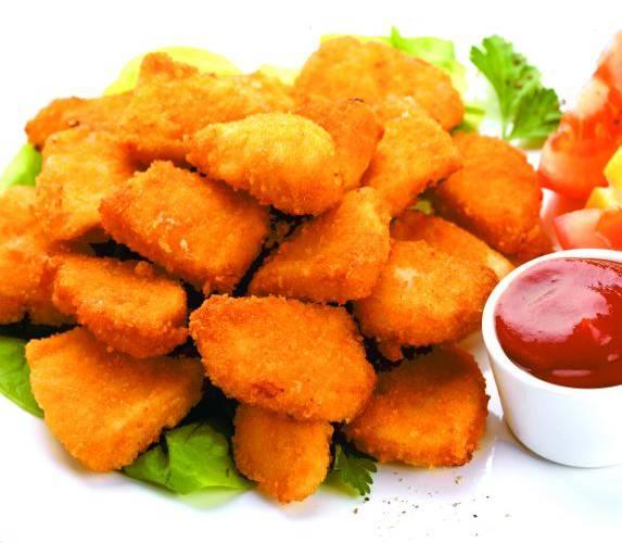 eggs, flour, olive oil, white pepper and a little salt together, and then coat the chicken nuggets; Allow the nuggets to stand for 20 minutes; Put chicken nuggets into frying basket evenly, set time