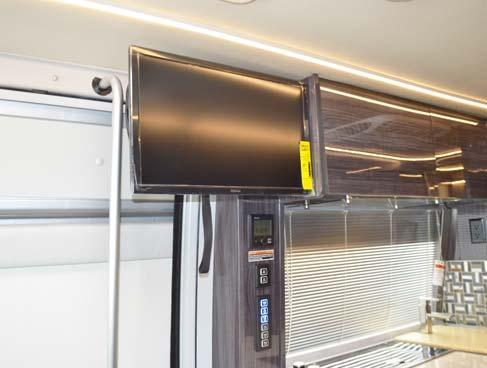 TV SWIVEL (MODEL 70M) If Equipped (Typical View Your coach may differ in appearance) Your coach is featured with a TV swivel/ telescoping mechanism, which allows you to angle the