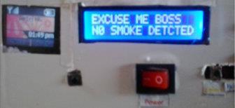 Once the system switches ON (activated), the controller caries out all the necessary initialization and display EXCUSE ME BOSS NO SMOKE DETECED.