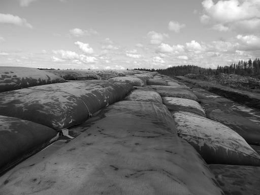 layers (Figure 1) to form a pyramidal type geometry (see Wilke et al 2015 for case study on stacked tubes). Figure 1. Stacked dewatered geotextile tubes (5 tube layers high) after Wilke et al 2015. 2.2 Flocculation The majority of the tailings is likely to be at the lower end of the grading curve i.