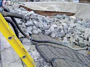 The engineer knew what to do: place geotextile on the subgrade and place armor stone riprap on the geotextile to prevent further scour.