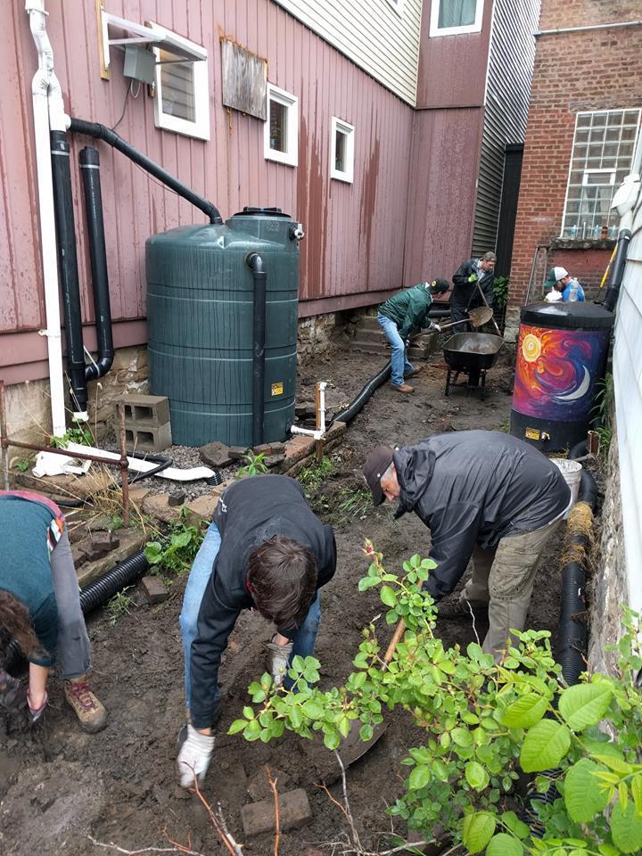 Our Sustainability Rain Garden and Cistern: In the backyard, you ll find a 500 gallon cistern that collects rain water from our