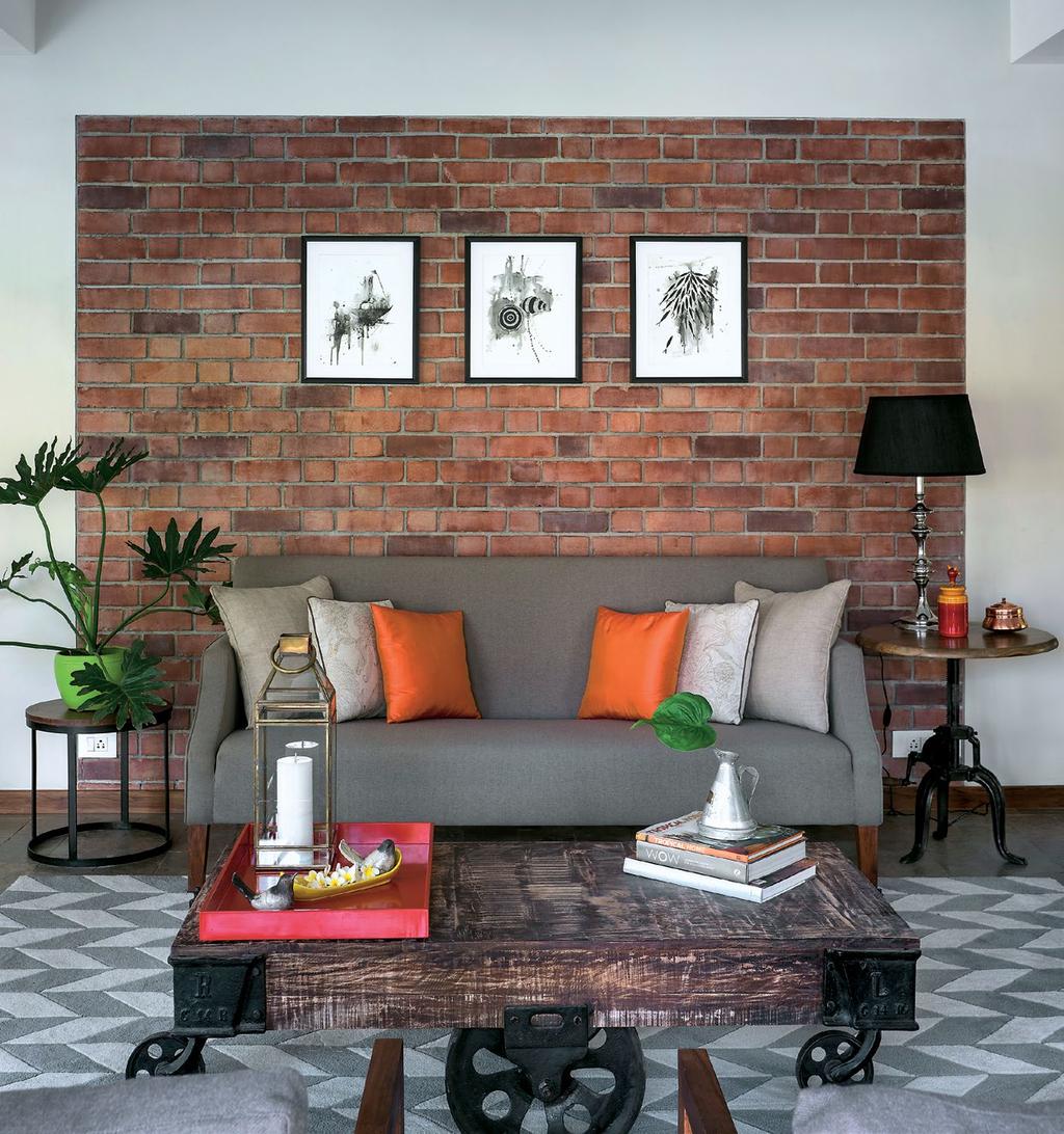 spaces Home The brick wall together with the repurposed cart as a table are
