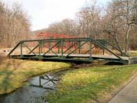 20 Mile Road Bridge Bridge Type: Five panel full-slope Pratt pony truss with riveted connections. Construction Date: 1907 Builder: Unknown Length: 70 Feet (21 Meters) Roadway Width: 15.4 Feet (4.