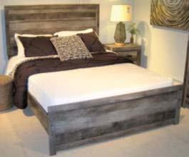 headboard panel with horizontal channel details Large scaled bed option features a crossbuck design Slim profile dual USB charger located on back of night stand top
