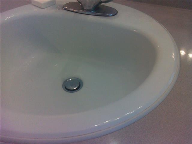 6.5 The left ensuite sink drained very slowly and was likely plugged.