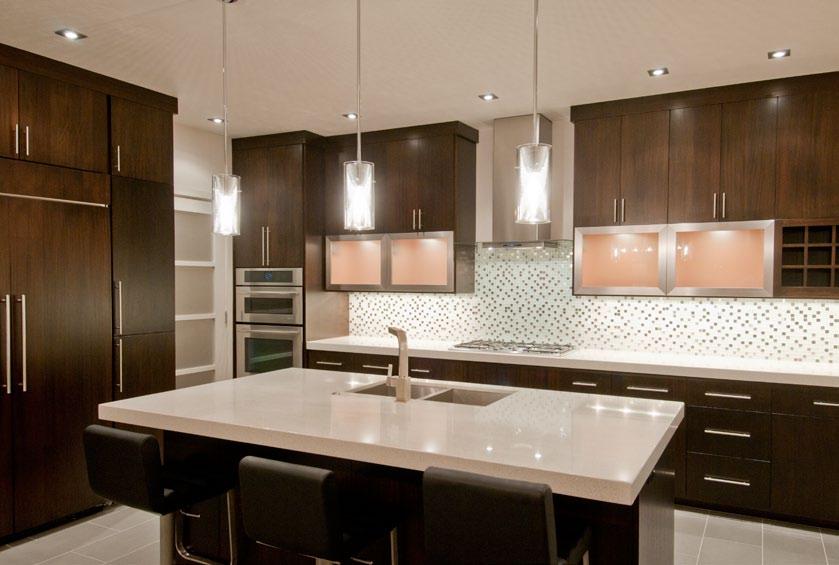 The kitchen features European-style Sapele cabinets with quartzite countertops, and a mosaic backsplash. During the seven-month construction process, the Nelsons worked closely with Cooper.
