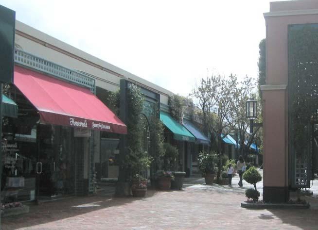 The upper right image features retail shops fronting onto a corridor. The lower left image features a double pathway with central lawn and adjacent townhouses.