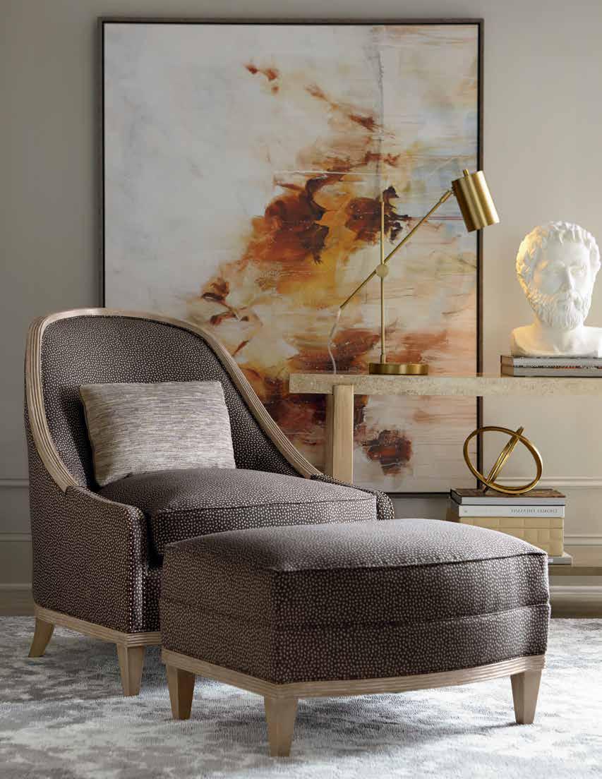 The seat cushion gets its bounce from coil construction wrapped in a down blend. with 5323AA Charcoal fabric Cooper Slipper Chair Ottoman 532524-5323AA 28W x 20.5D x 16.