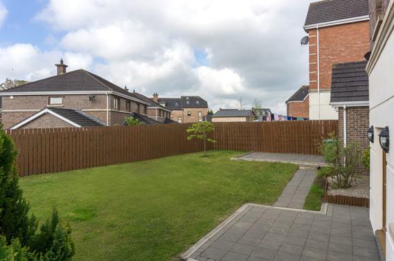 Fully enclosed gated private rear garden with two feature patio areas.