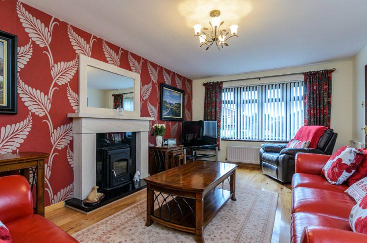 The Property Comprises: ENTRANCE PORCH: Tiled step. Mahogany effect upvc double glazed door with matching side panels, leading to... SPACIOUS RECEPTION HALL: Laminate oak effect flooring.