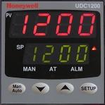 The current setpoint is selected by a digital input. This option is exclusive with UDC1200 limit model remote alarm reset.