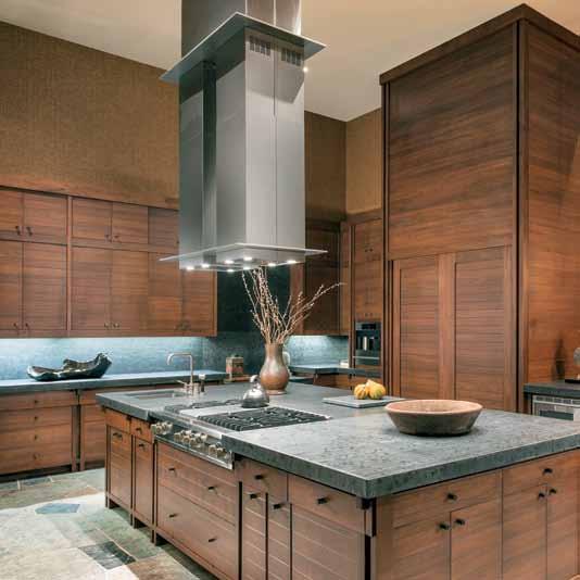 The kitchen s cabinetry, conceived by the architect and designer, was made by Affordable Custom Cabinets.
