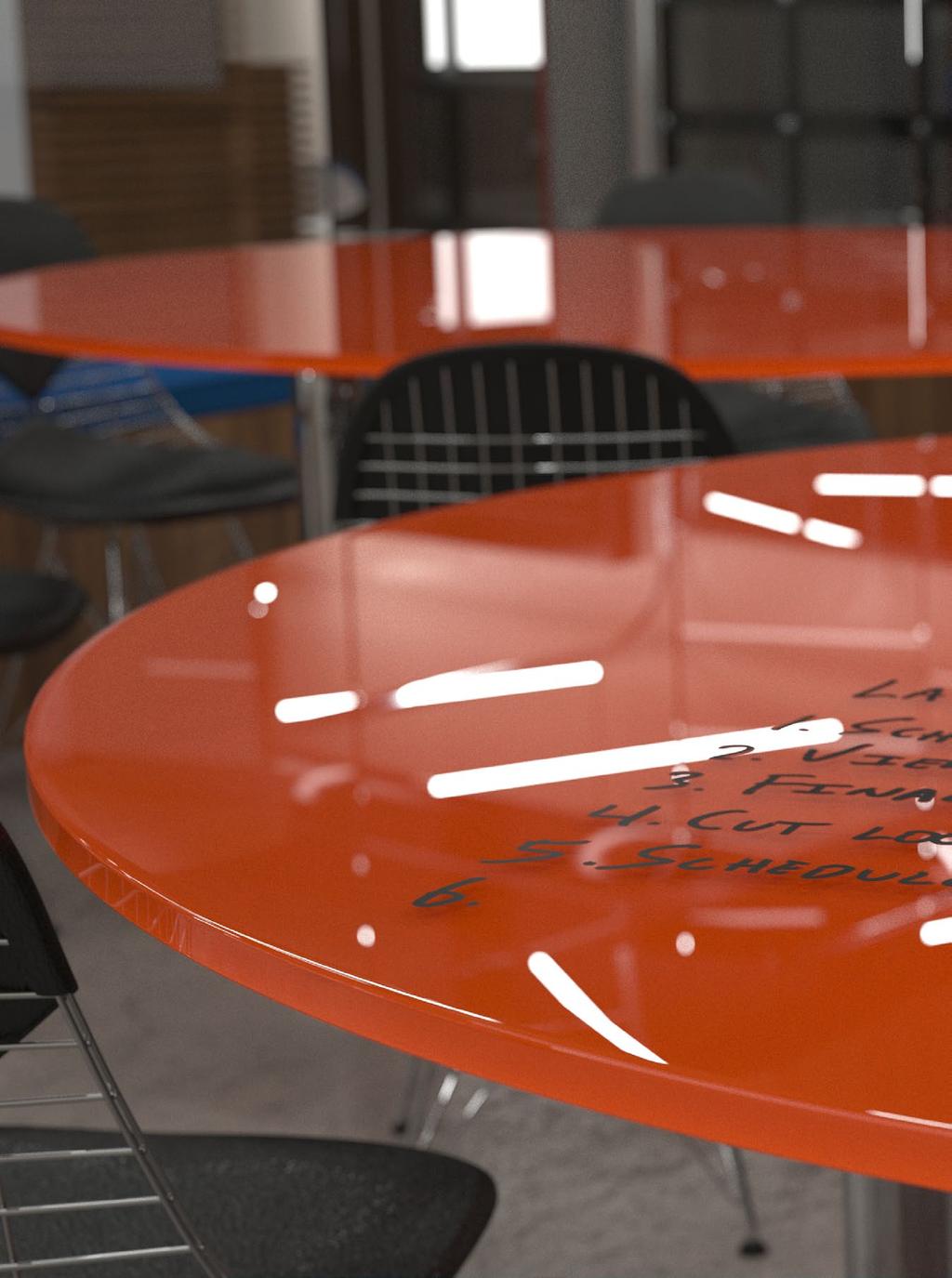 ELEGANCE WITH A PURPOSE The versatility of a writing surface and the beauty of colorful Clarus glass all in a tabletop.