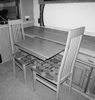 SECTION 9 - FURNITURE AND SOFTGOODS BUFFET TABLE AND CHAIRS (Typical View Your coach may differ in appearance) Buffet Chairs The Buffet Chairs are free-standing to allow greater freedom of
