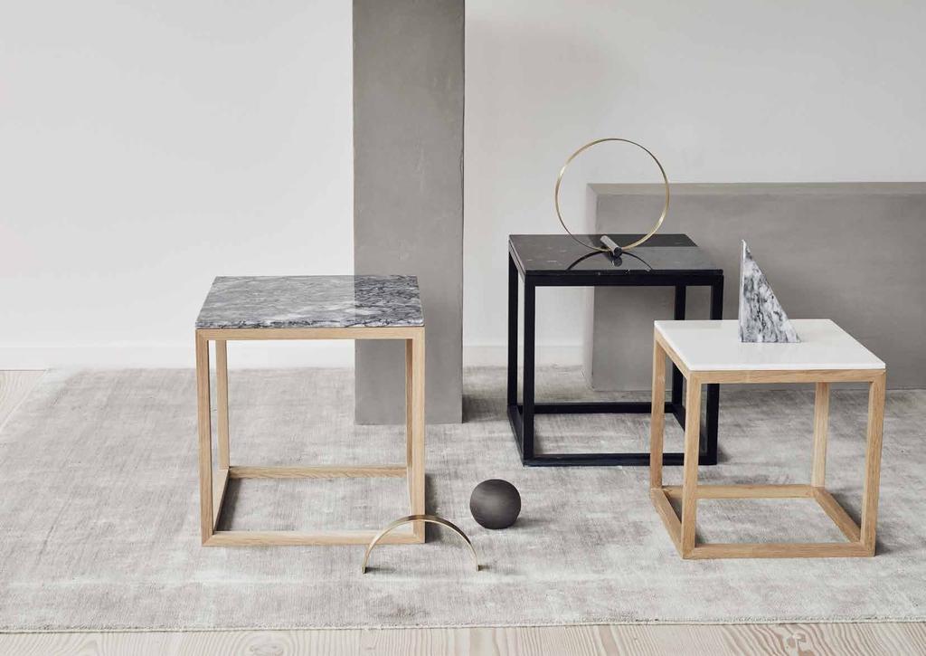 Cube Table customize your table. Combine a solid oak or black painted oak frame with three different kind of marble tops.