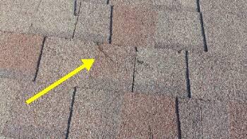 Some shingles lightly damaged from hail.