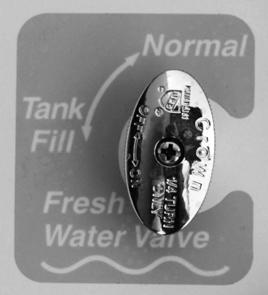 Turn the Fresh Water valve to the Tank Fill position. Fresh Water Valve (Located in water service center) Fresh Water Valve (Located in water service center) 3. Turn city water supply ON. 4.